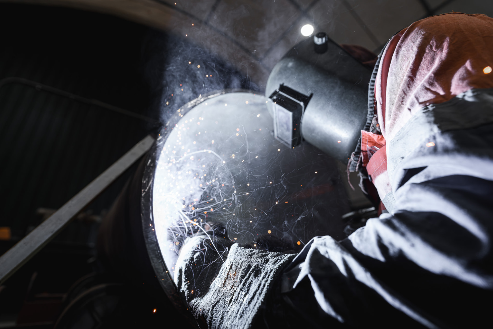 Close view of a welder working on steel
