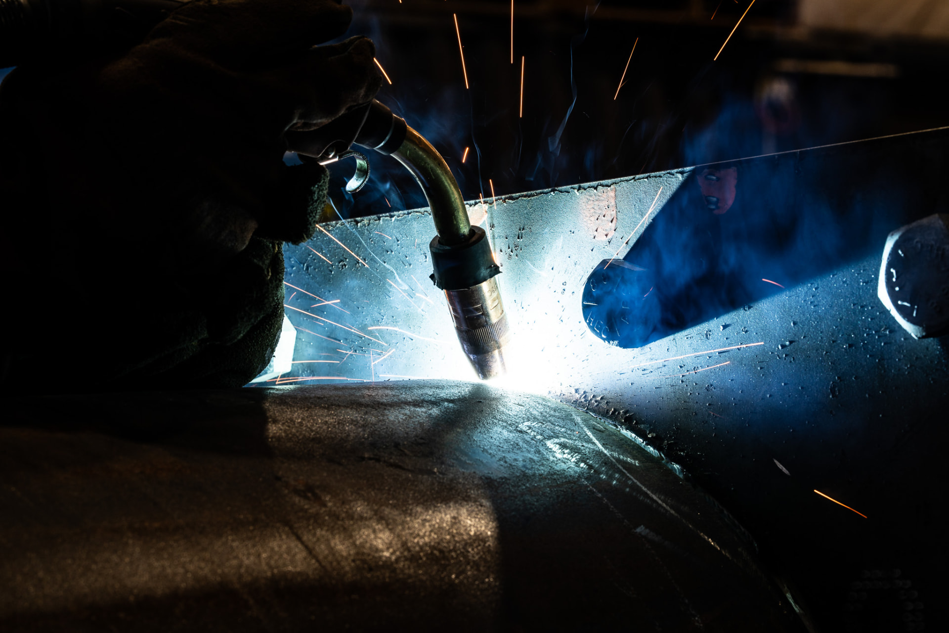 Welding torch joining a steel assembly