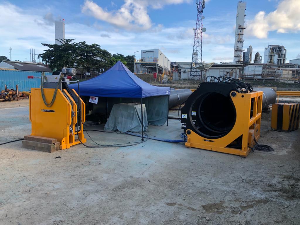 Pipe fusion equipment set up at an industrial facility