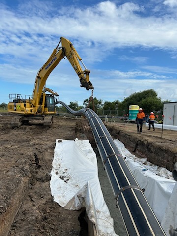 Large diameter pipeline being installed for the Aura and Harmony Trunk Infrastructure Project
