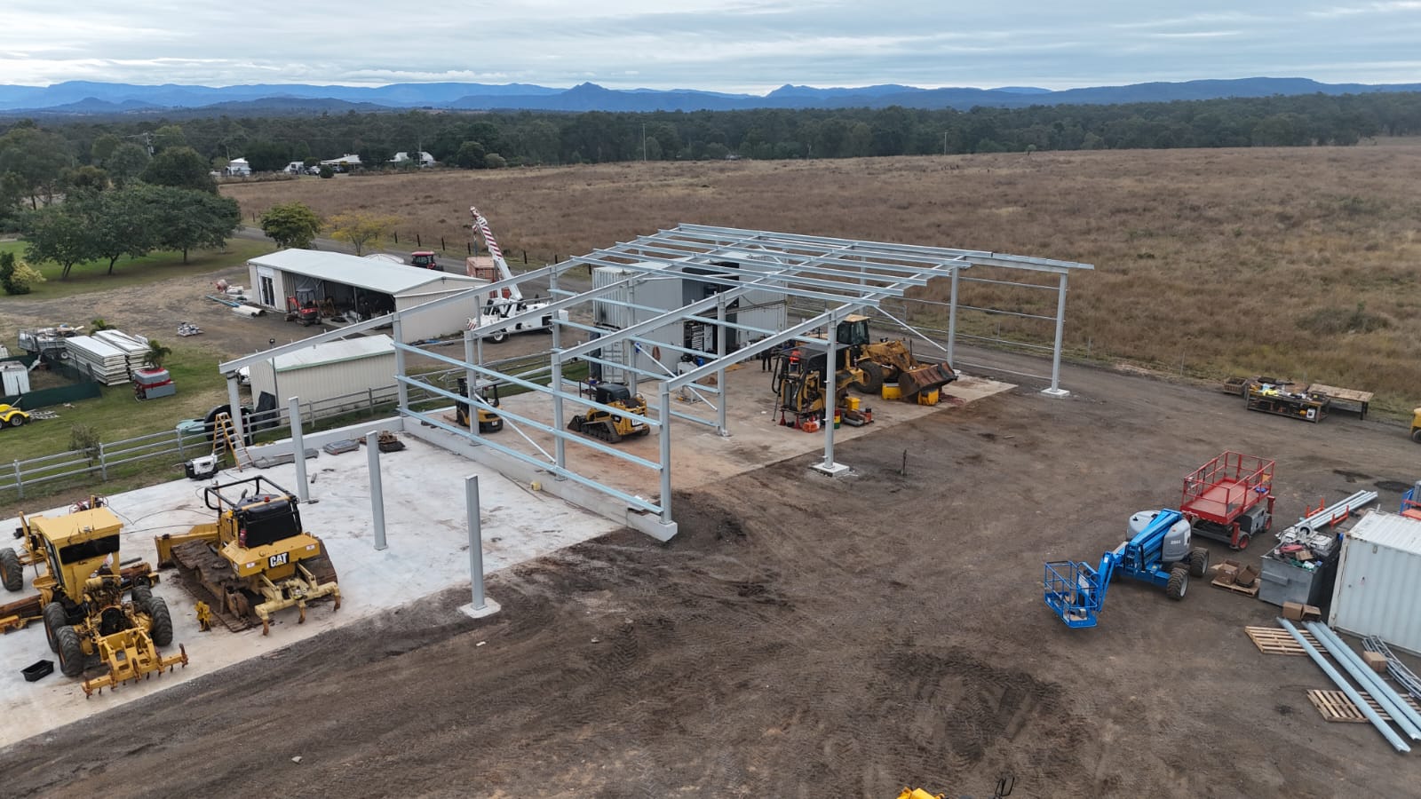 Steel workshop frame under construction in a fabrication yard